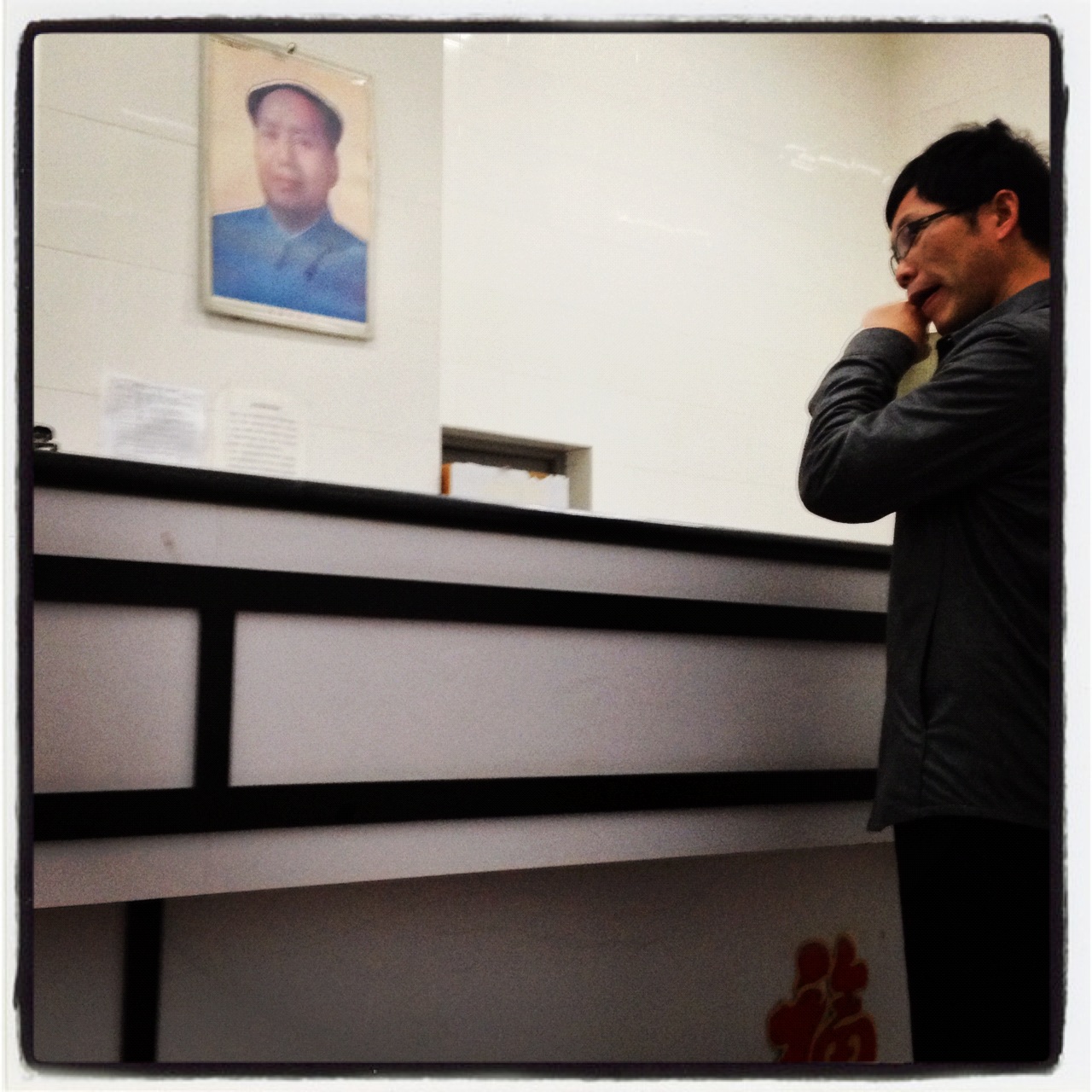 Mao works the photocopy room